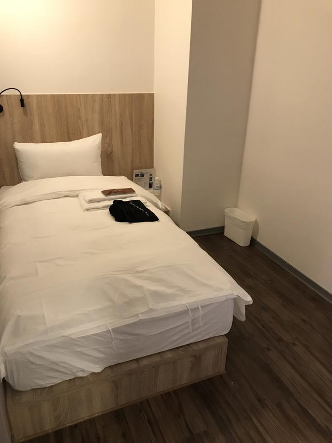 Single Inn-Kaohsiung Station Rom bilde